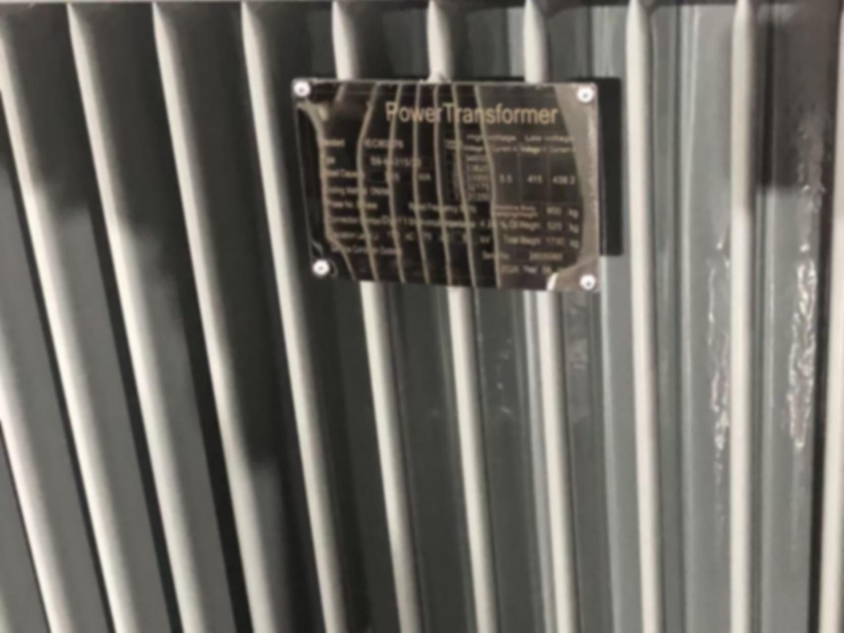 What do the parameters on the transformer nameplate represent?